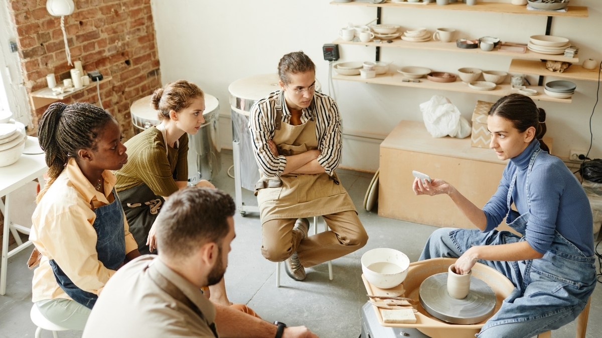 people attending a pottery workshop