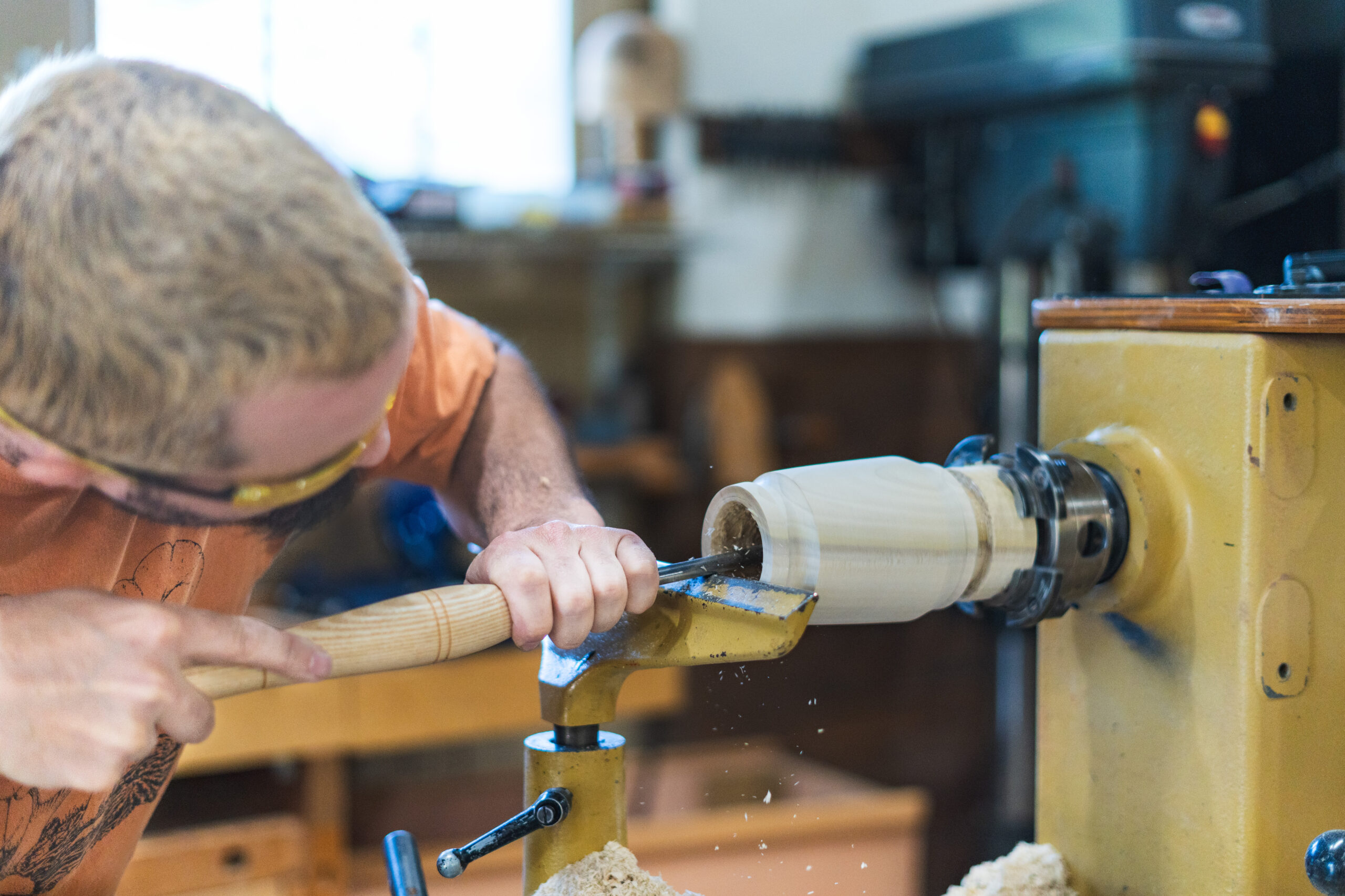 Teacher turnin wood at the Brookfield Craft Center