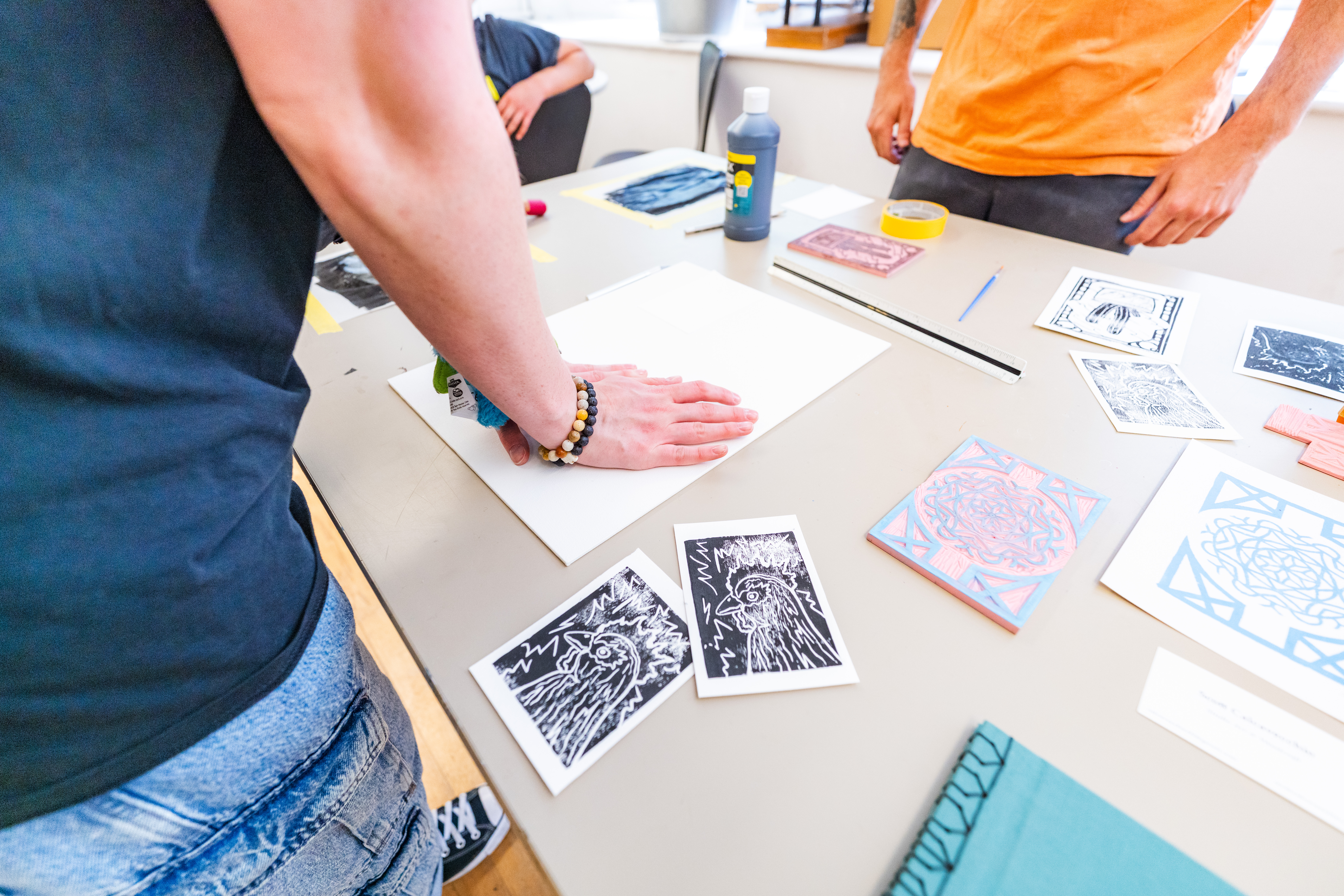 Students printing block prints at the Brookfield Craft Center.