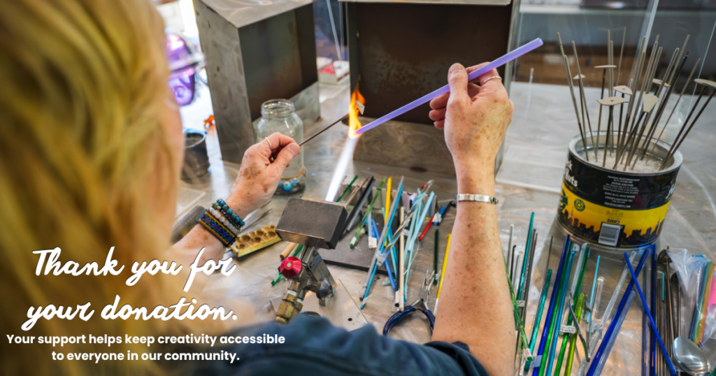 Student practicing glass bead, lampwork at Brookfield Craft Center